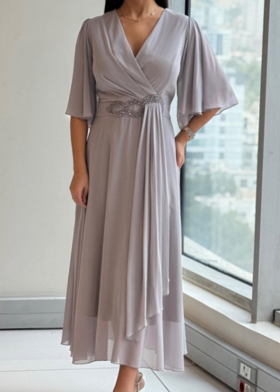 Elegantiška ilga suknelė progoms